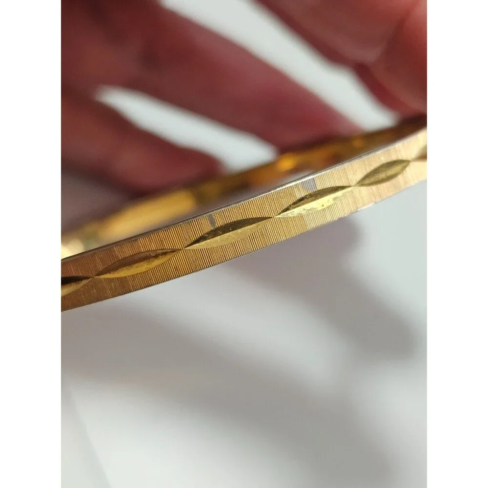 Monet gold tone diamond cut bangle bracelet 7.75